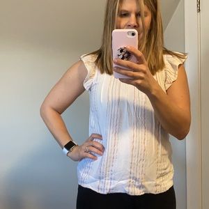 Sleeveless loft top